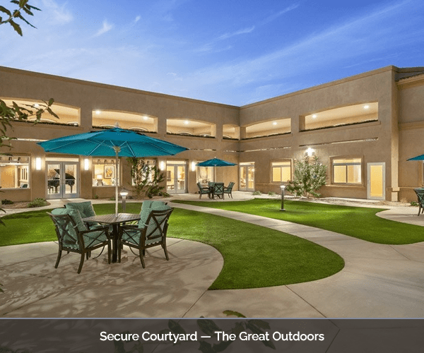 Outdoor courtyard with seating and umbrellas
