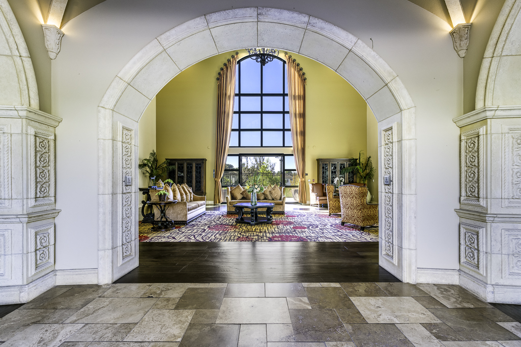 Interior common area with large windows and seating