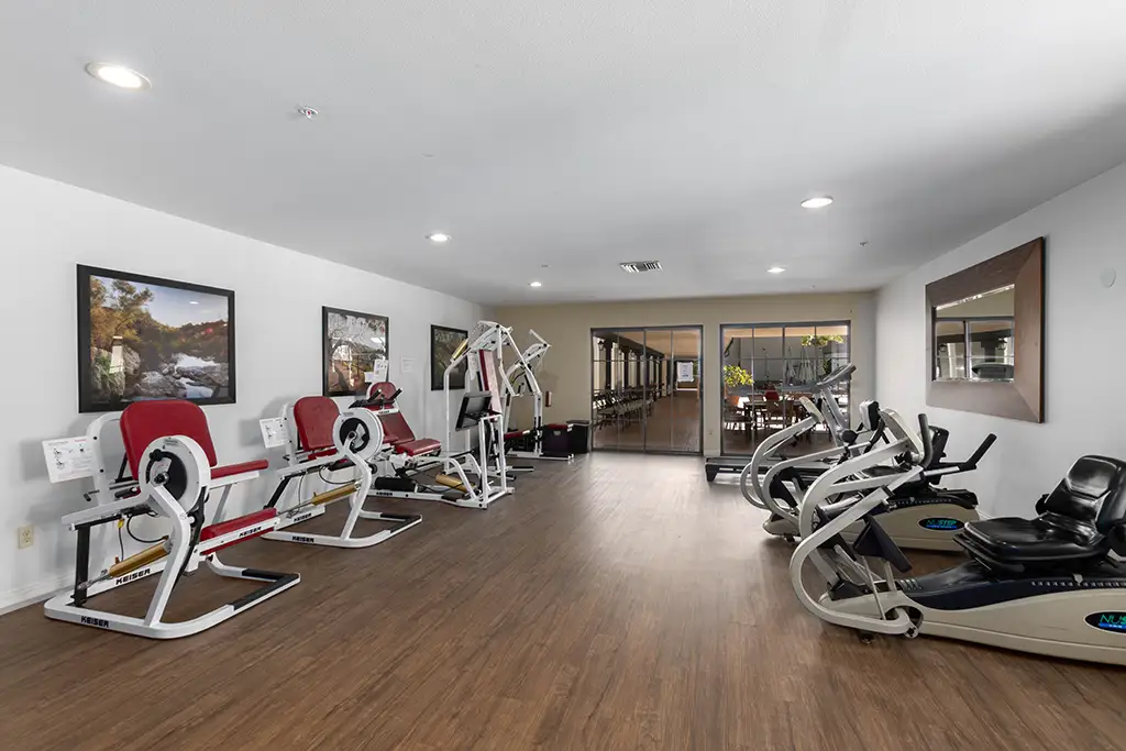 Interior view of a fitness area with exercise equipment