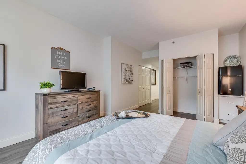 Cozy resident room with a bed and TV