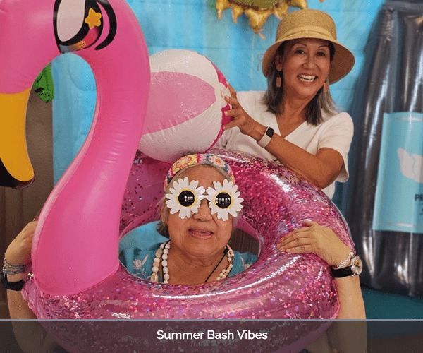 Residents celebrating with summer-themed decorations