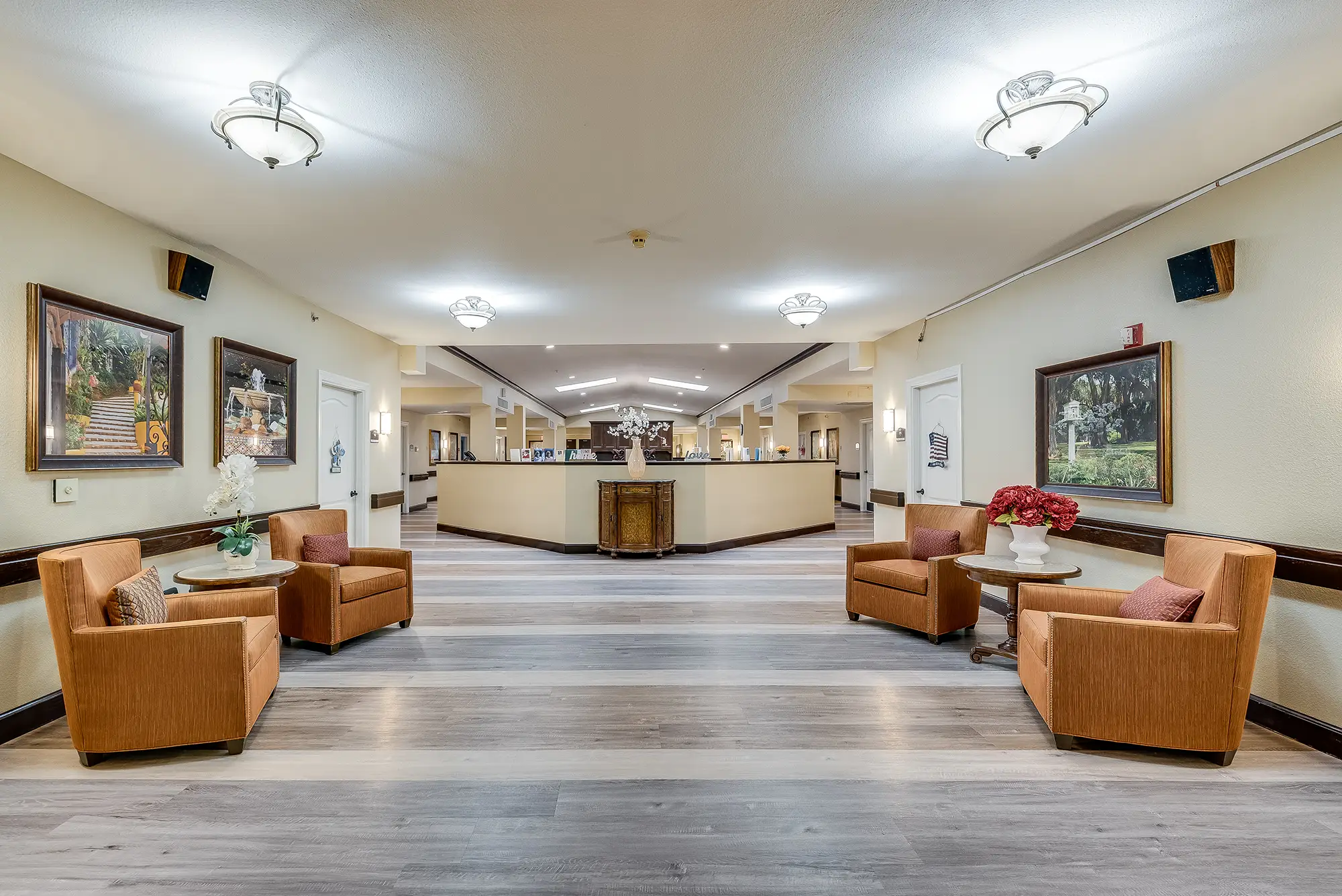 Bright common area with chairs and artwork