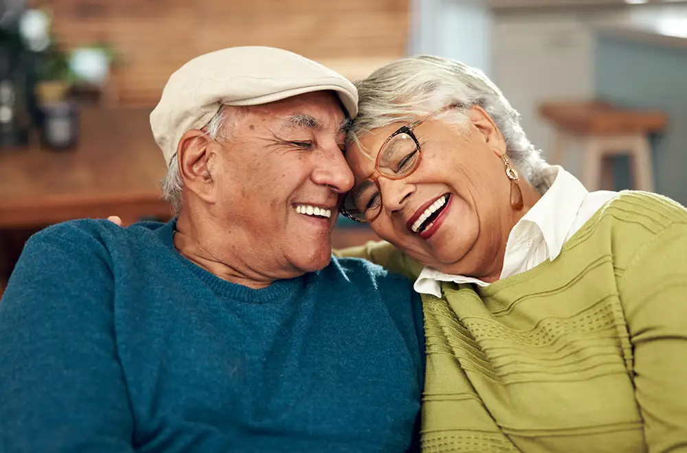 A happy elderly couple sharing a joyful moment