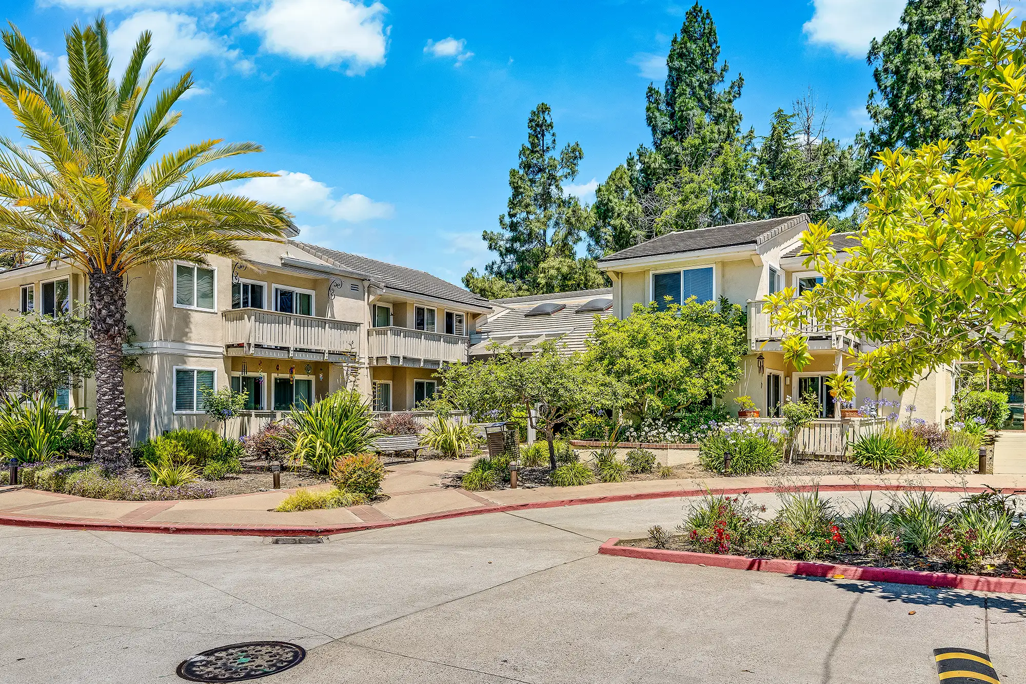 Exterior view of Oakland Heights Senior Living with gardens
