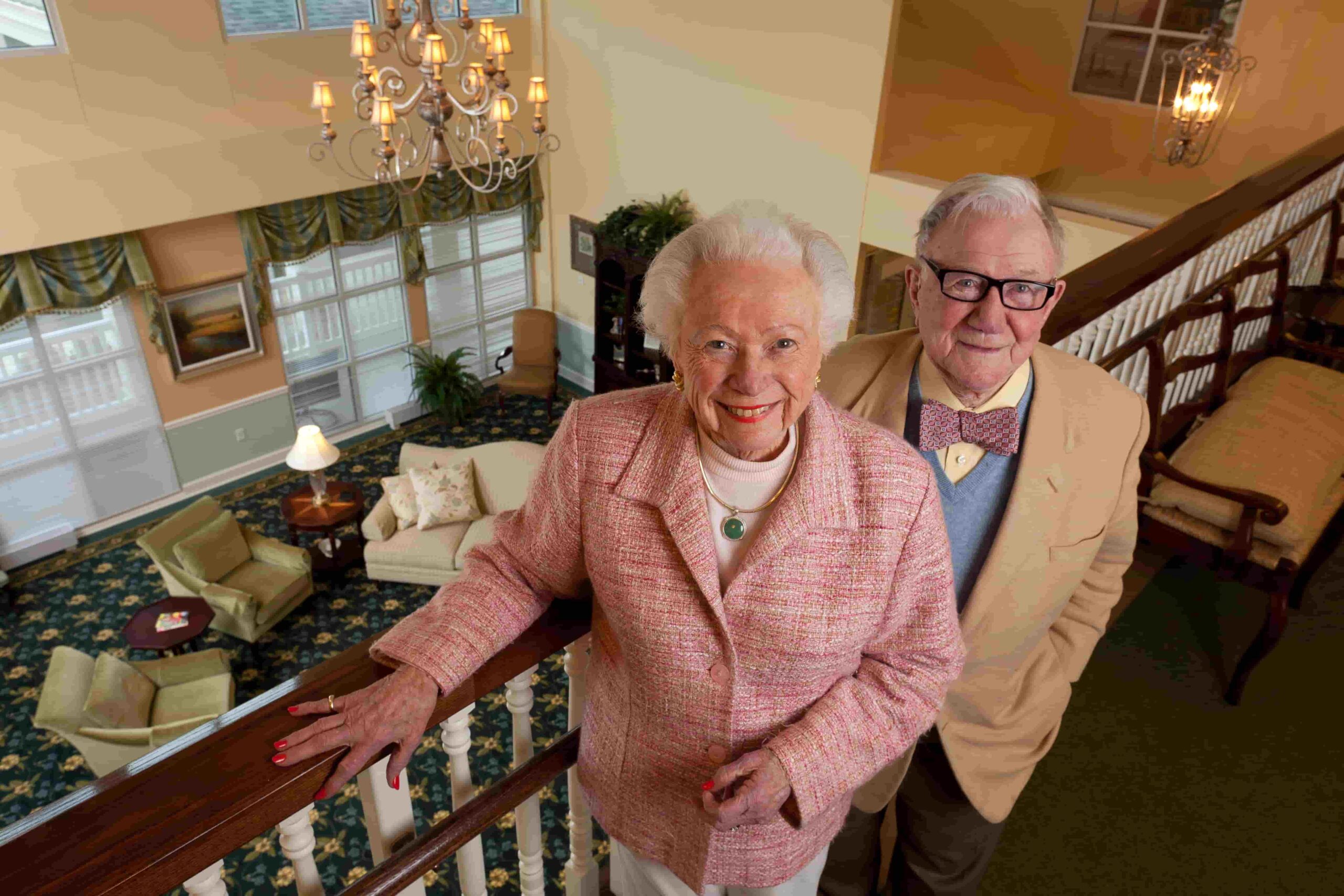 Residents smiling in a comfortable common area