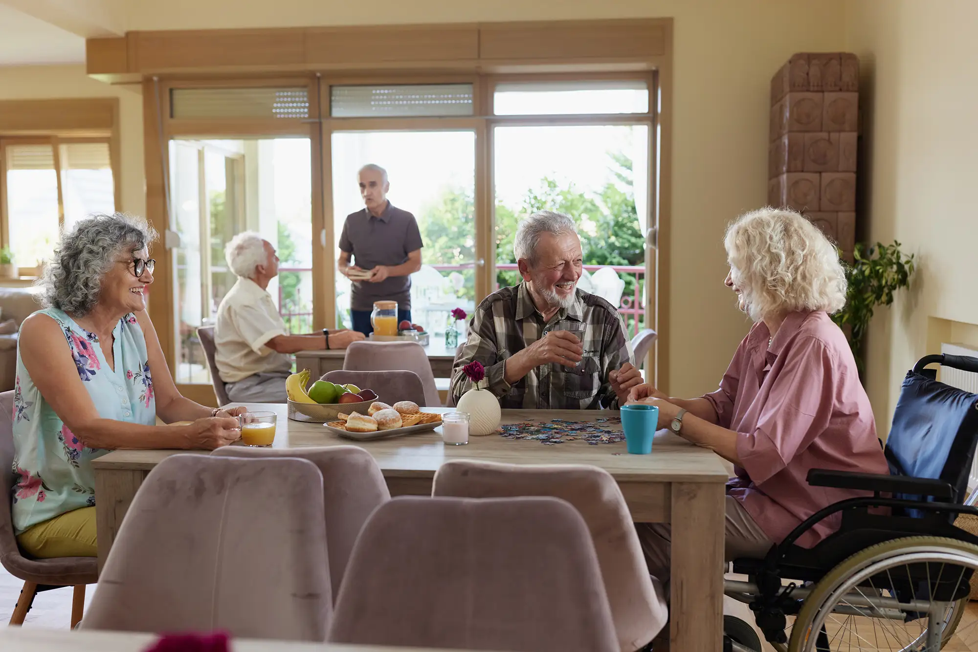 Residents engaging in a social activity in a common area