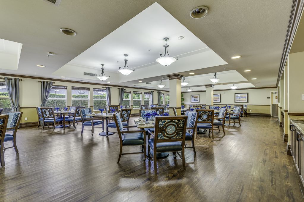 Dining area with colorful chairs and tables