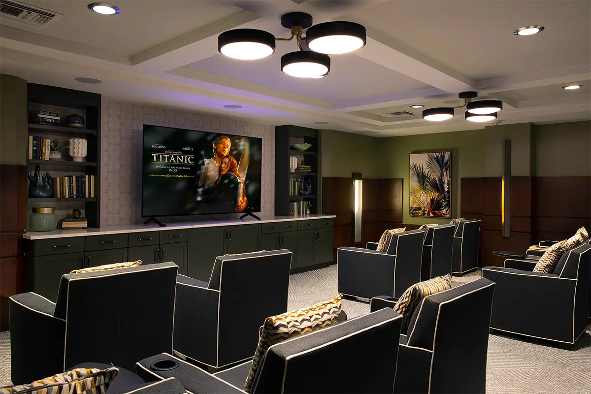Comfortable movie theater seating in a cozy common area