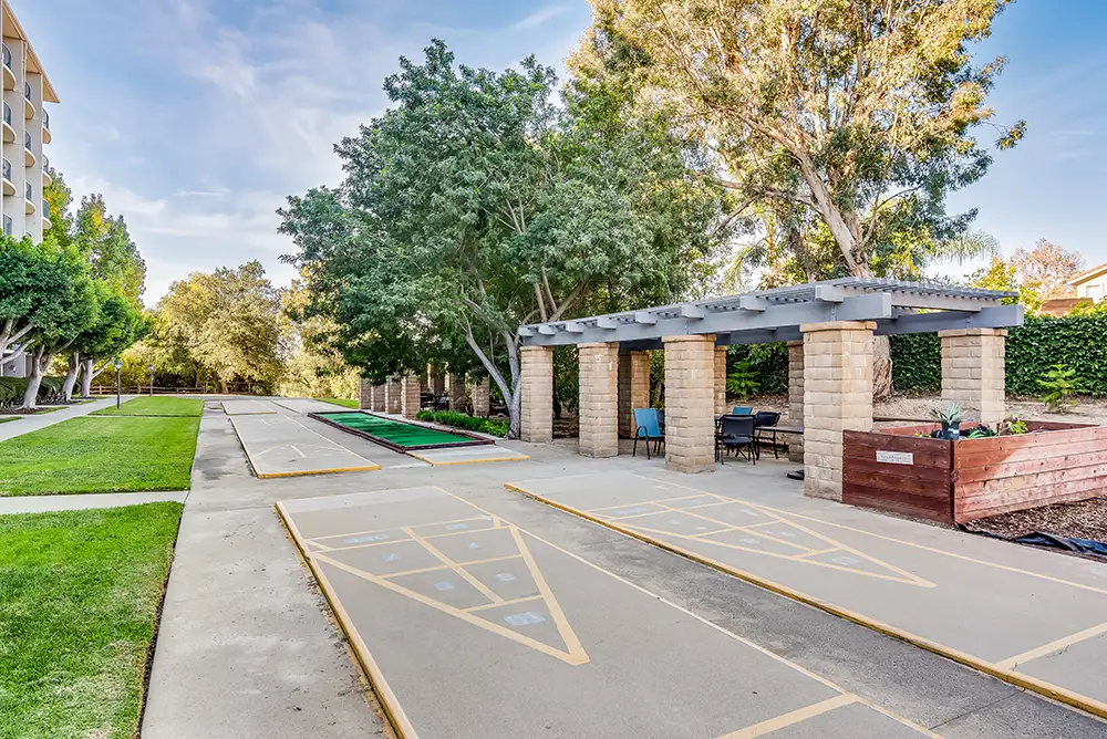 Outdoor space with shaded patio and garden area