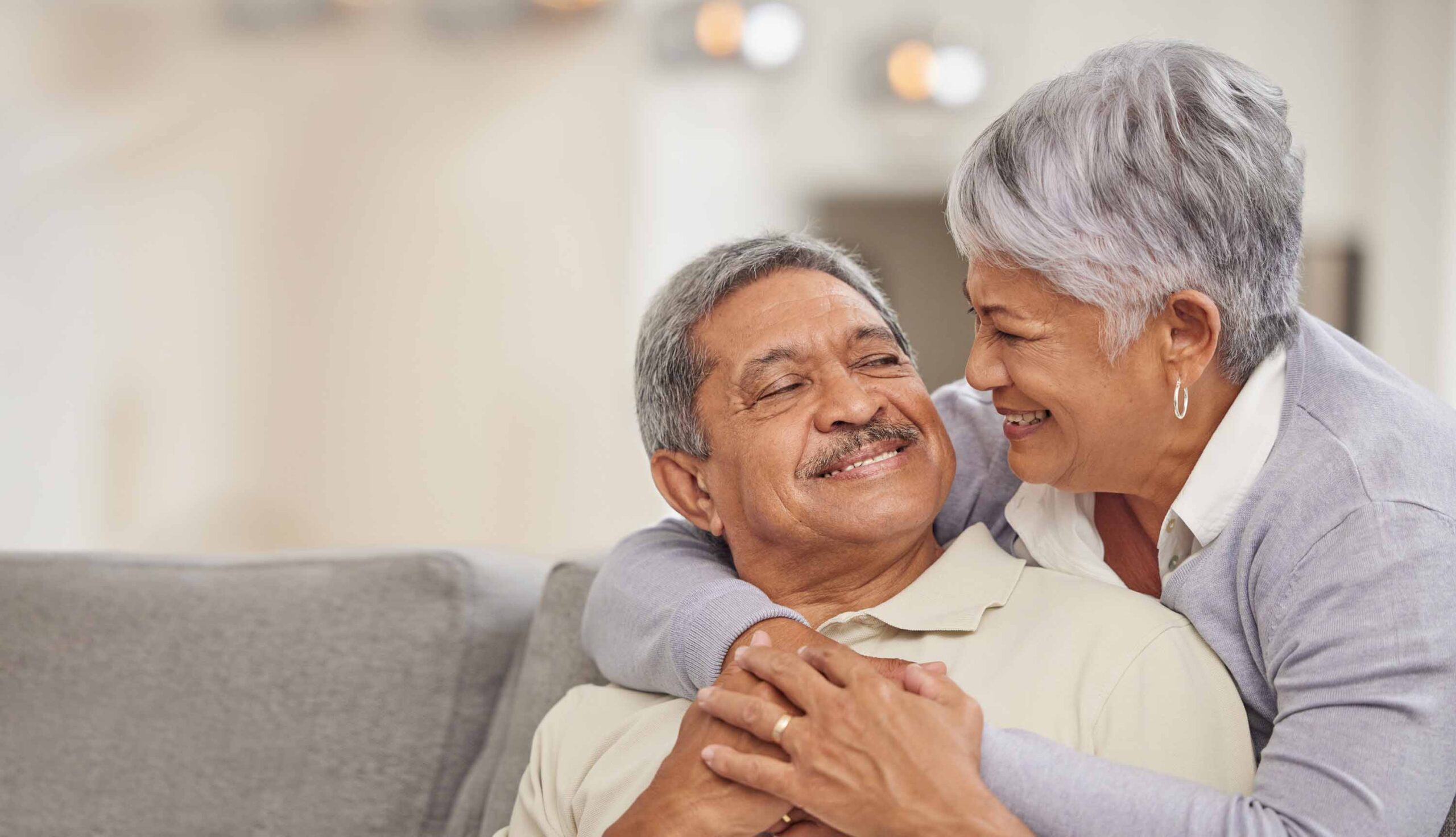 Couple enjoying time together in a cozy living space