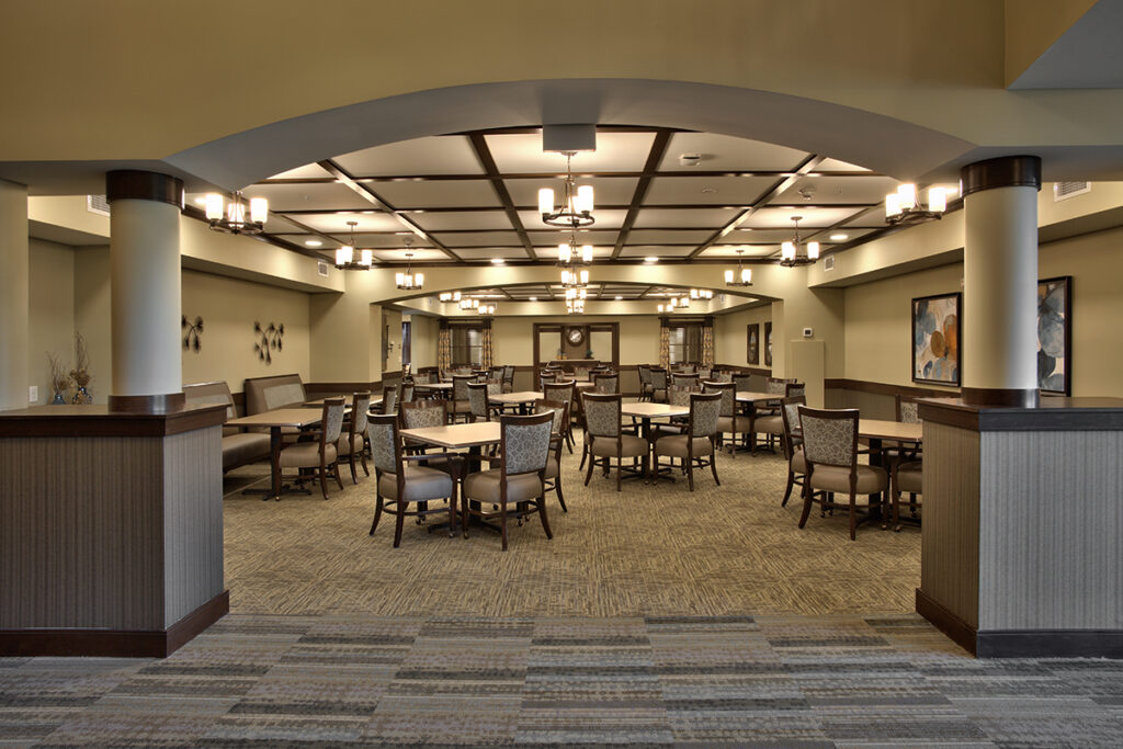 Interior dining area with tables and chairs
