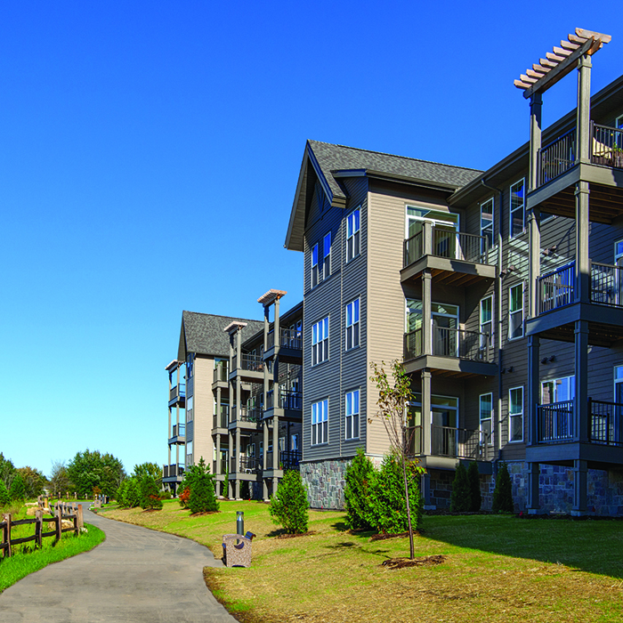 Exterior view of Fairway Knoll with landscaped path