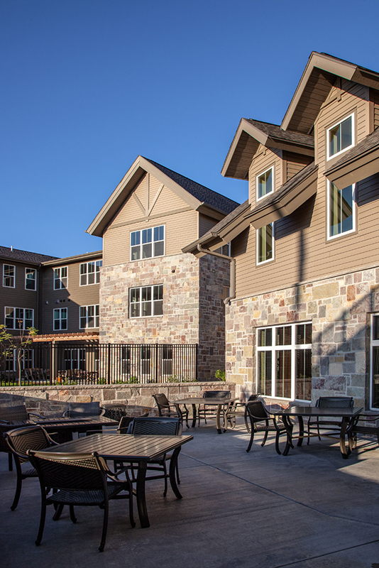 Outdoor patio seating area at Fairway Knoll