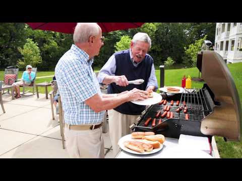 Residents enjoying a barbecue outdoors