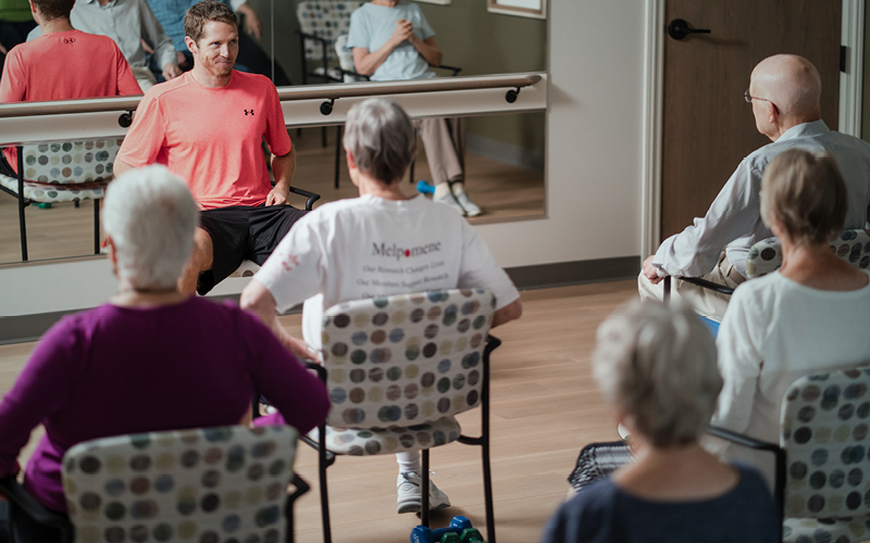 Residents participating in a wellness activity session