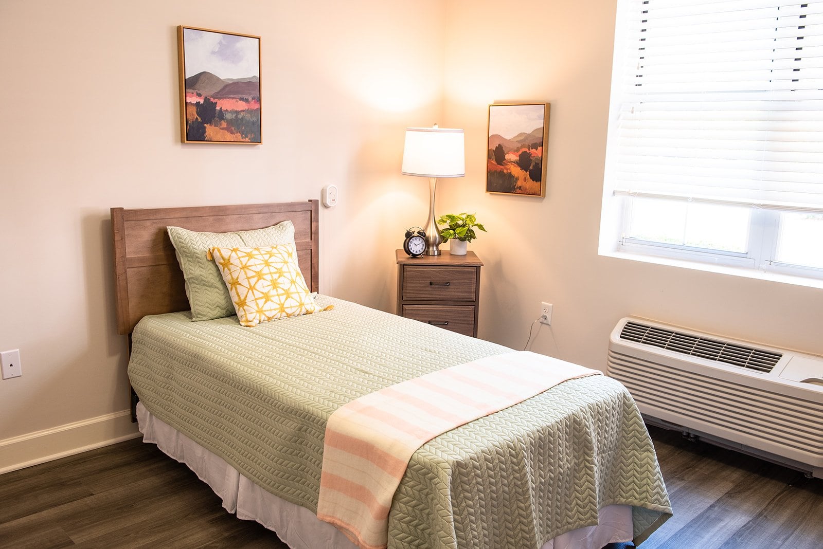 Cozy resident room with bed and decor