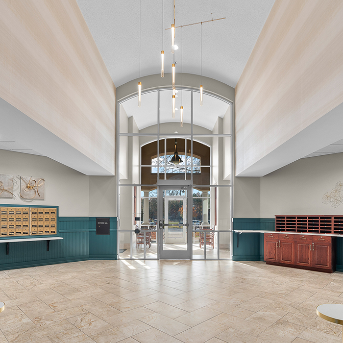 Bright lobby of a senior living facility with seating area