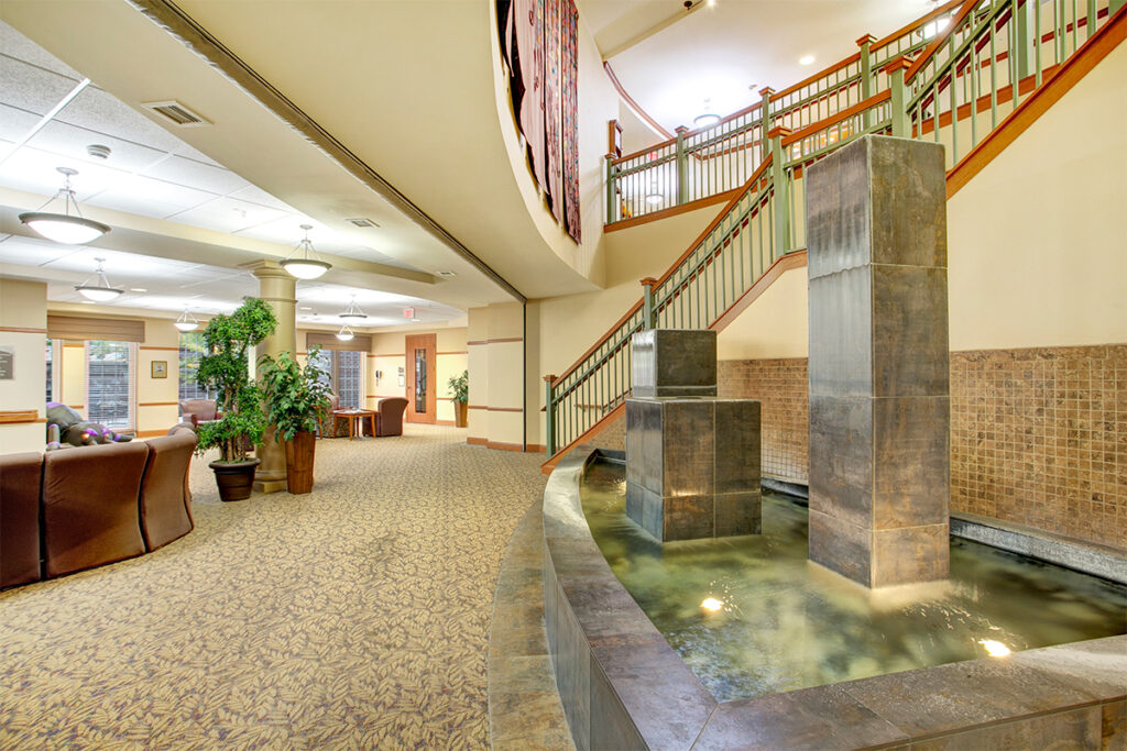 Interior view of a lobby with a water feature