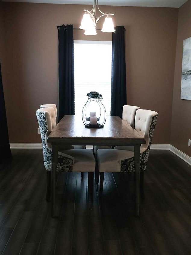 Stylish dining area with a wooden table and chairs