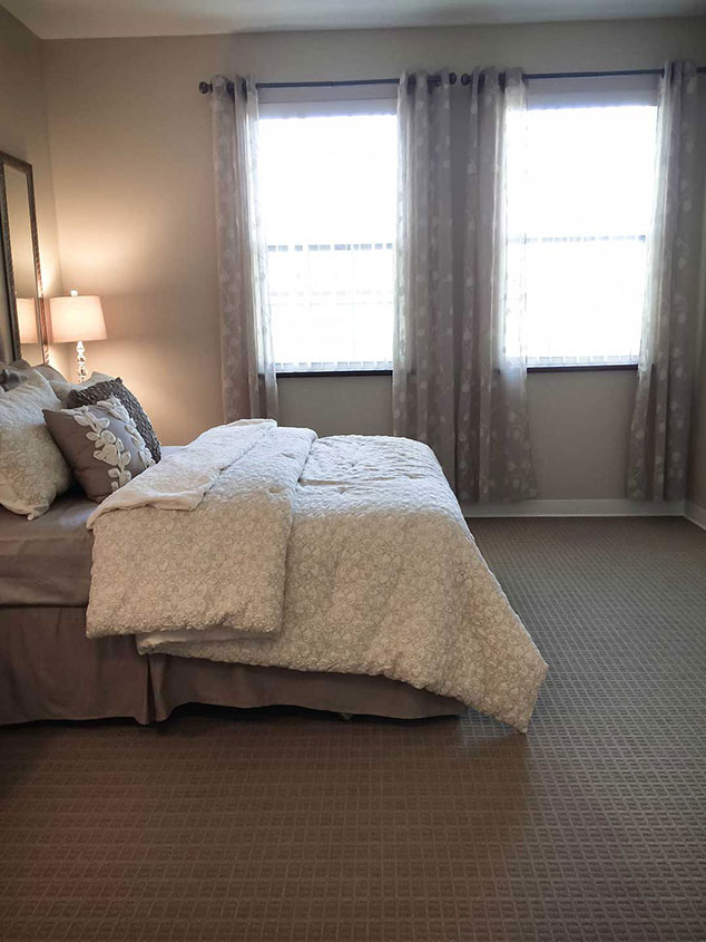Cozy private room with a bed and natural light