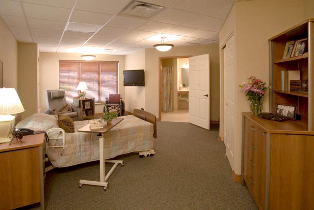 Interior view of a private resident room with furniture