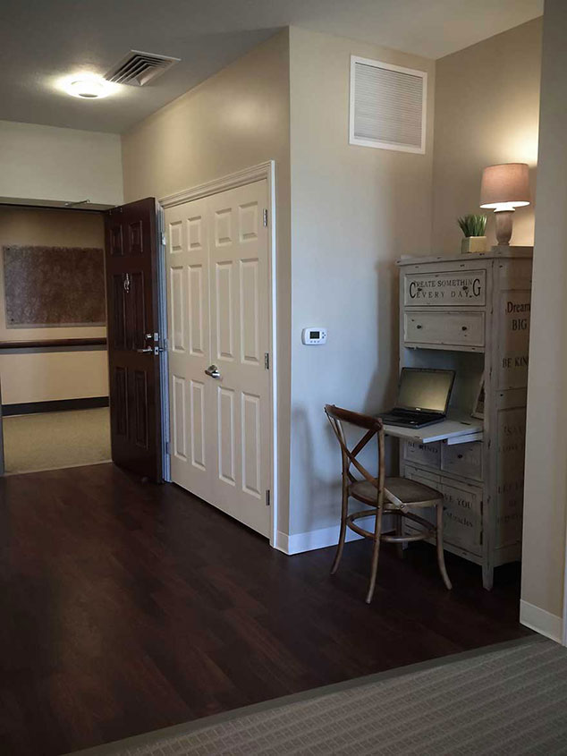 Cozy interior corner with a desk and lamp