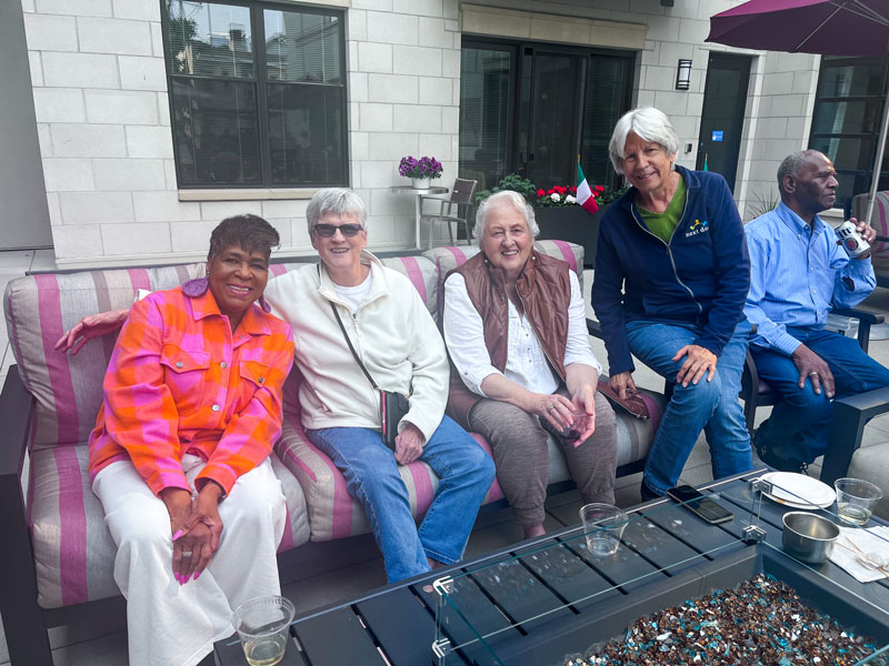 Residents enjoying time together on a patio