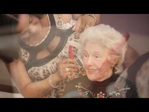 Resident enjoying a hair styling session