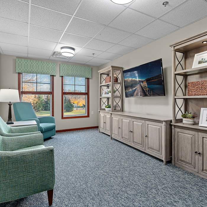 Bright common area with comfortable seating and decor