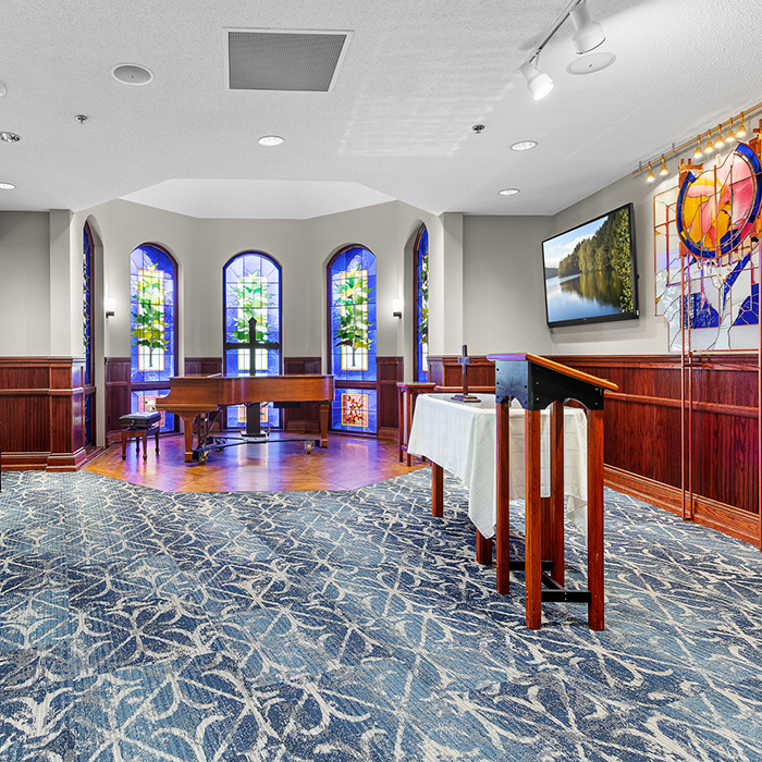 Interior view of a common area with stained glass
