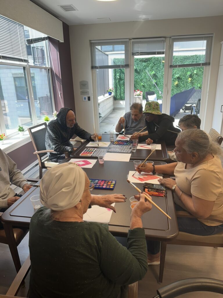 Residents engaged in an art activity