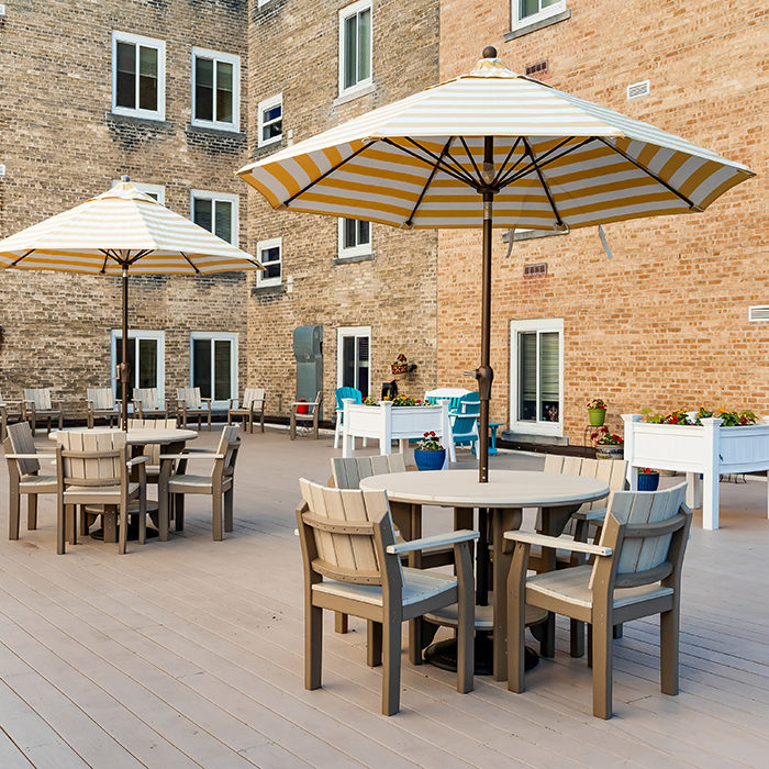 Outdoor seating area with umbrellas and tables