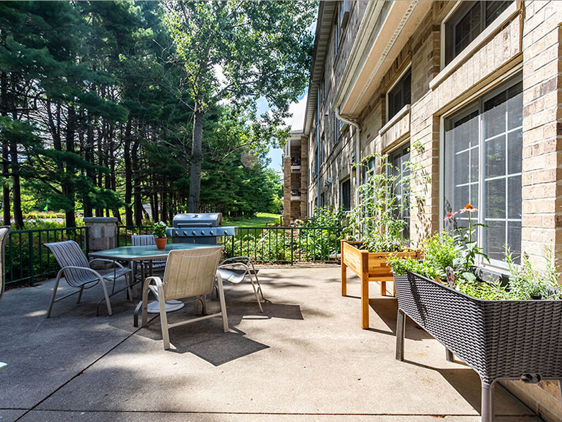 Patio area with seating and plants