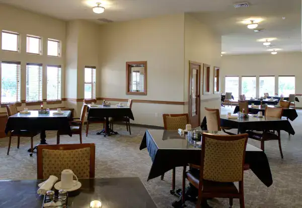 Dining room with tables set for meals