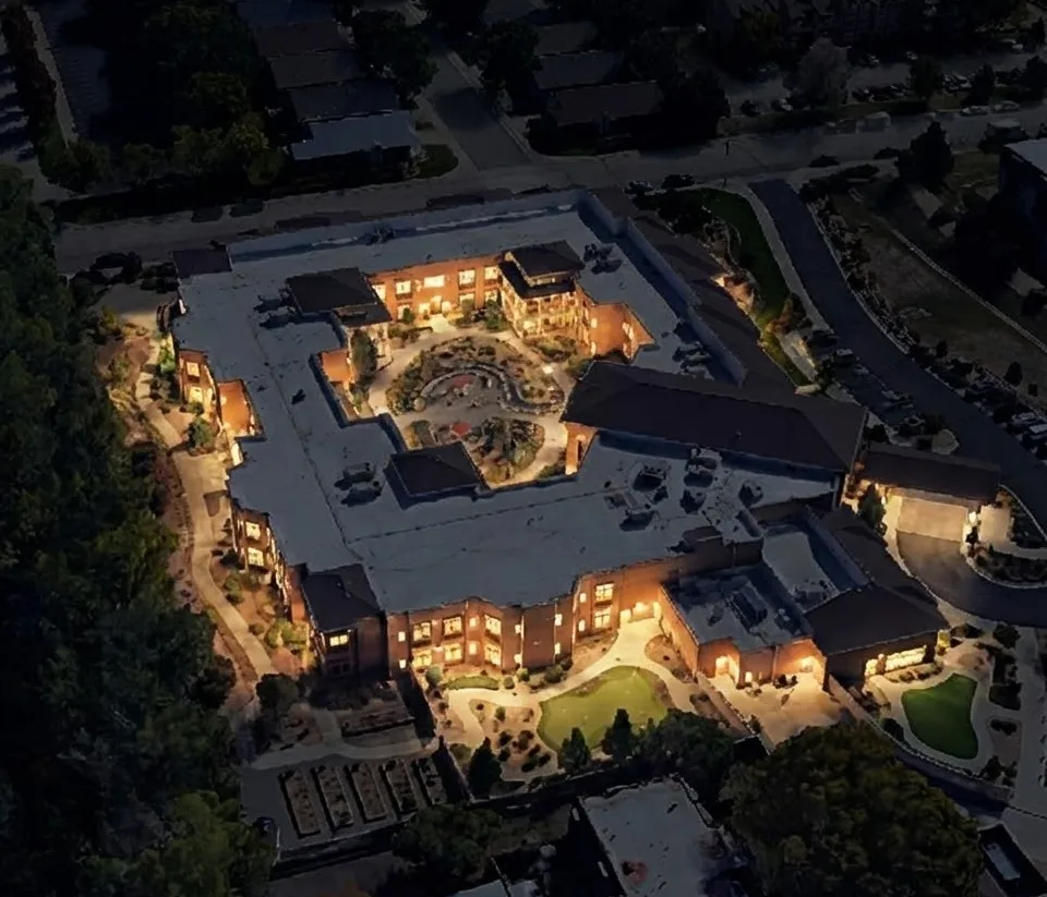 Aerial view of the Gardens on Quail Retirement Community at night