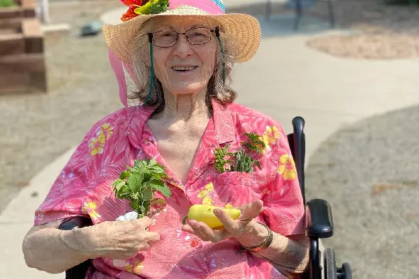 Resident gardening in an outdoor space