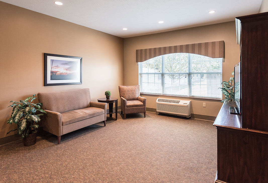 Cozy common area with seating and window view