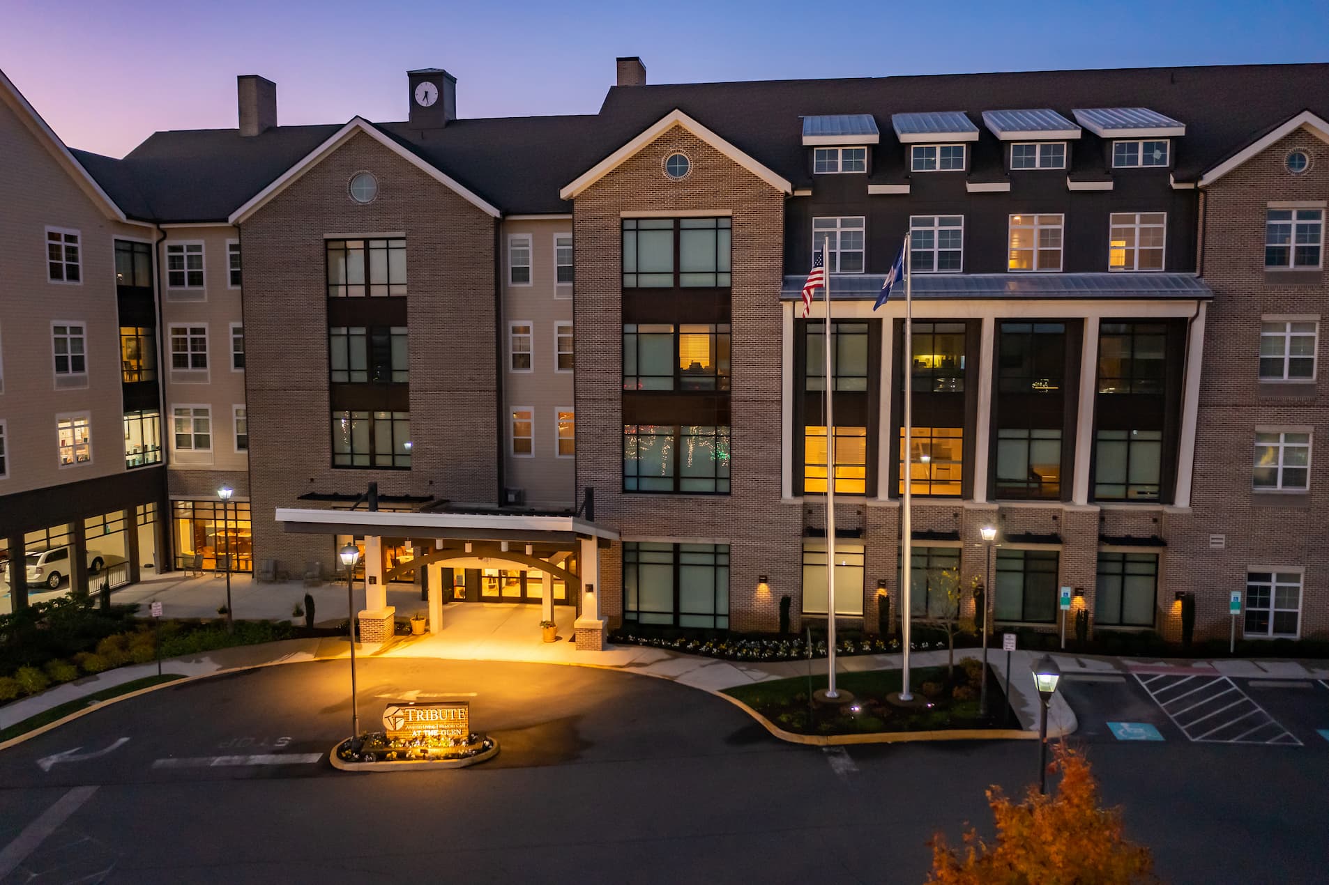 Exterior view of Monark Grove Greystone at dusk