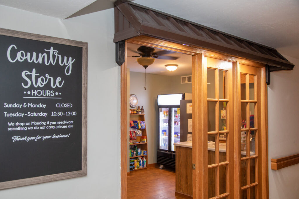Interior view of a facility's store with signage