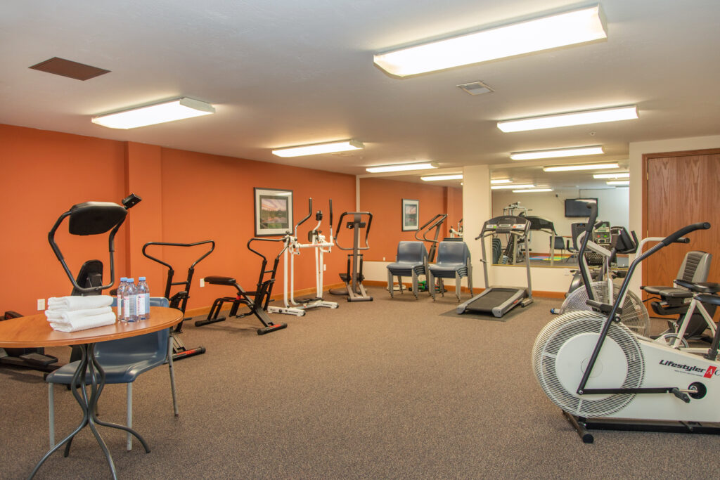 Interior view of a fitness room with exercise equipment