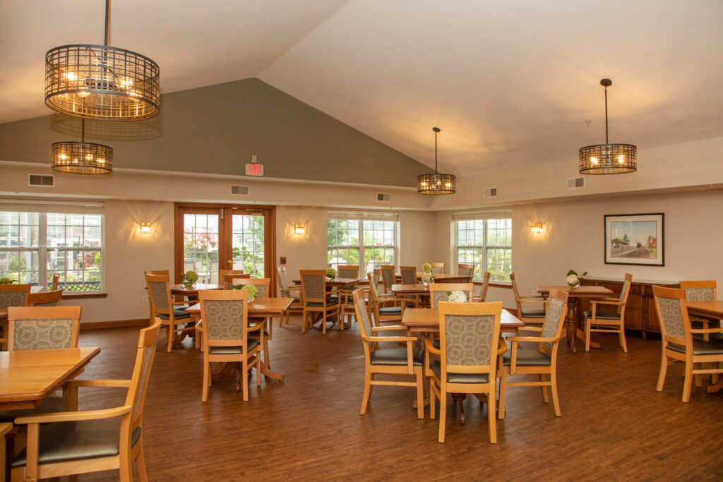 Bright dining room with wooden tables and chairs