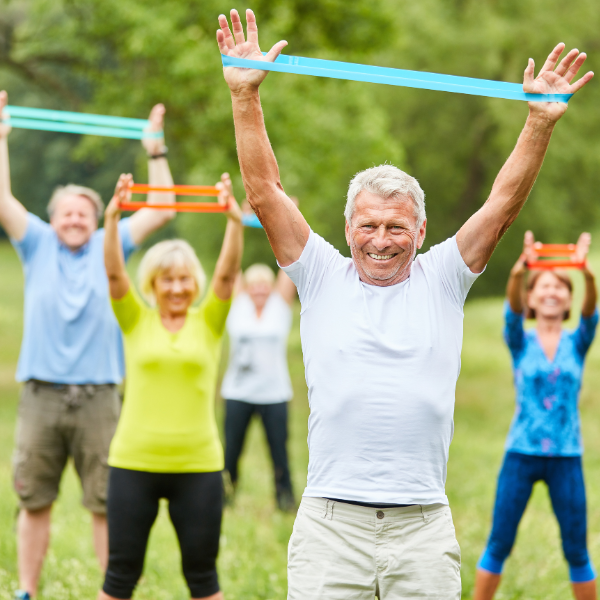 Residents participating in an outdoor exercise class