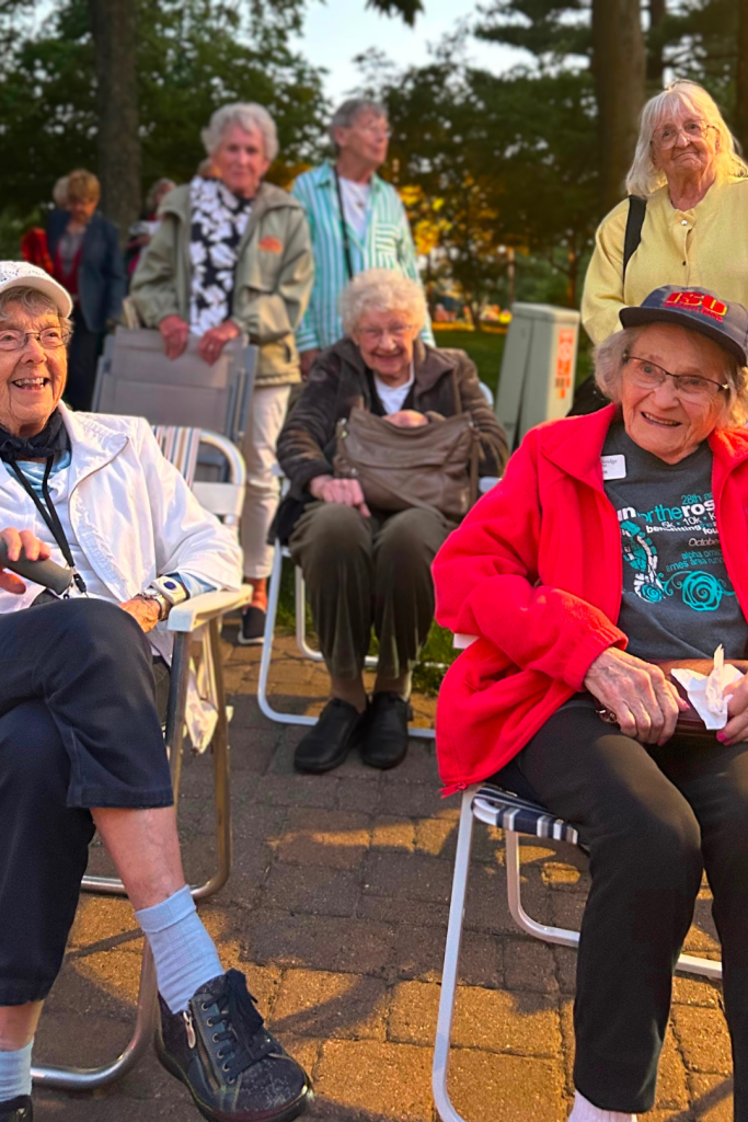 Residents enjoying a relaxed outdoor evening together