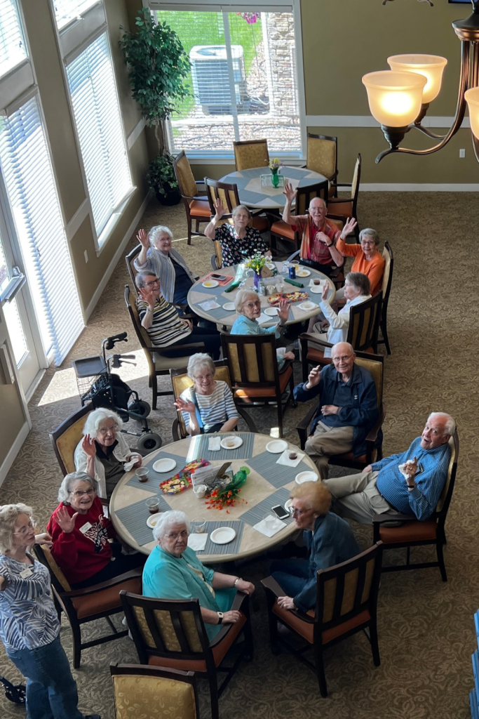 Residents enjoying a meal together in a dining area