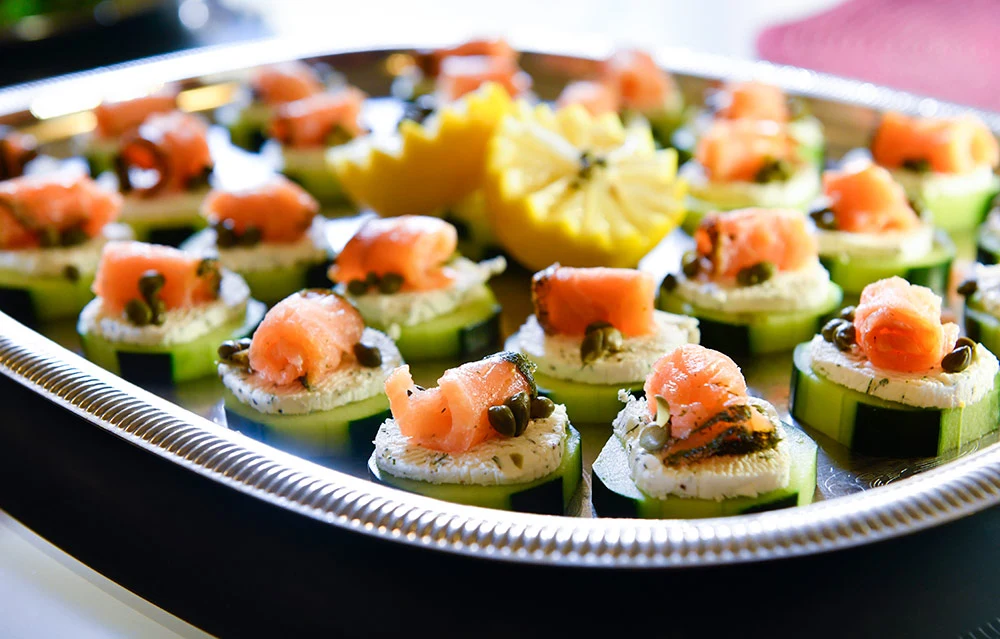 Close-up of appetizers on a catering tray