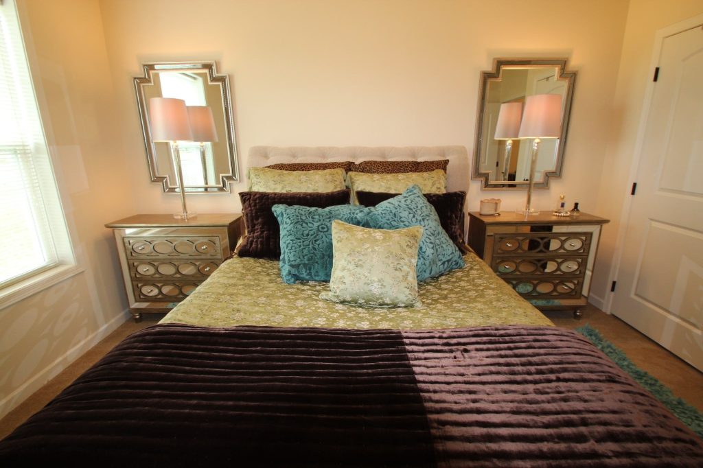 Cozy decorated bedroom with elegant bedding