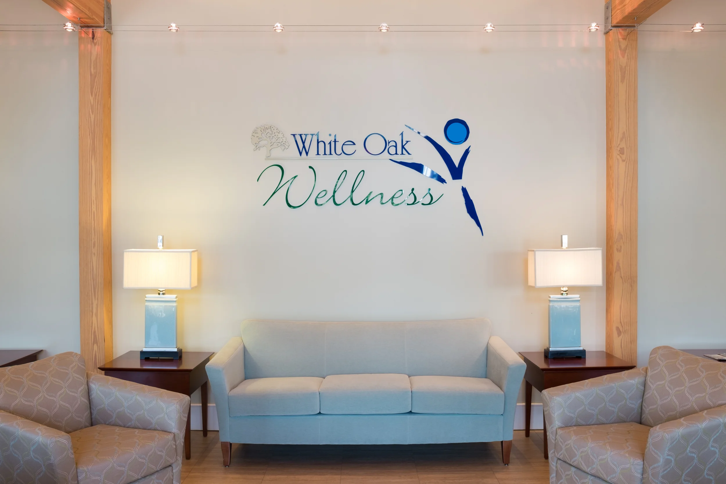 Wellness logo on the interior wall of the facility