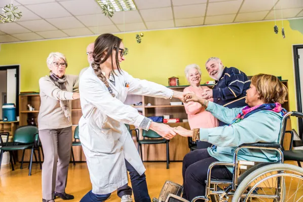 Residents and staff engaging in a group activity