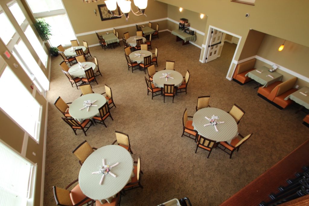 Dining area with neatly arranged tables and chairs