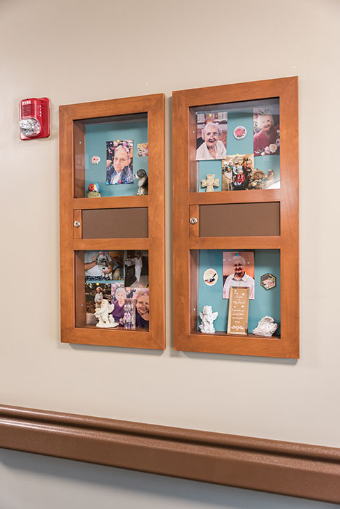 Wall display of resident photos and memorabilia